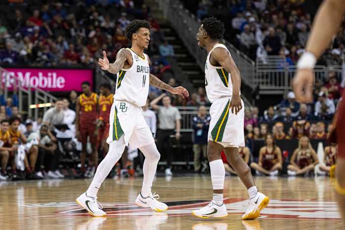 Baylor Bears teammates Jalen Bridges and Adam Flagler celebrate a play.